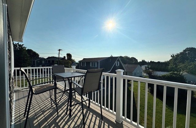 Short walk to the beach! See & hear the ocean in the distance. Great living area