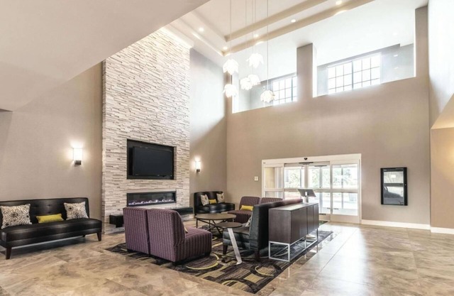 Sleep by the Thrills: 2 Cozy Hotel Rooms Near Six Flags & AT&T Excitement!
