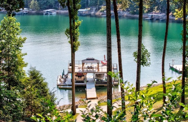 Sleeps 16 - On a deep & wide cove - 85+ GREAT reviews - HUGE dock - See our pics