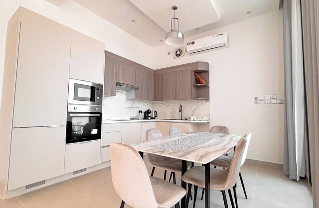 Spacious 3-bedroom apartment in charming As Sifah with WiFi, AC