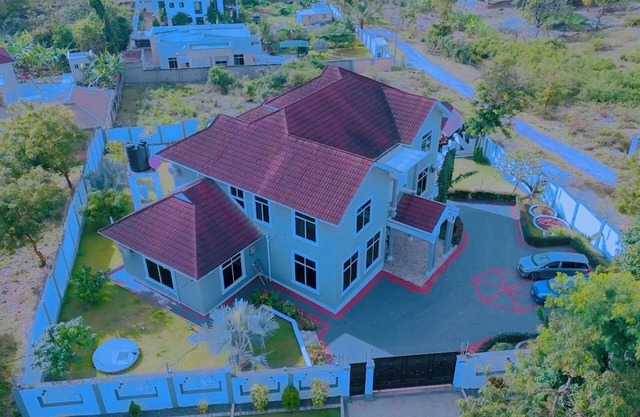 Spacious 5-bedroom villa in charming Dar es Salaam with WiFi, AC