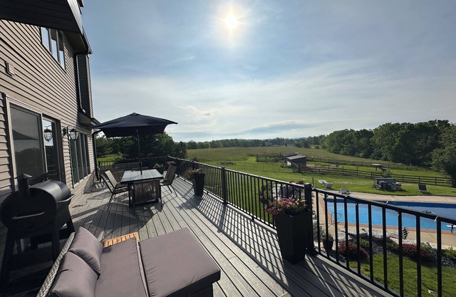 Spacious 5-bedroom house sleeps 14 with pool, hot tub, sauna and more!