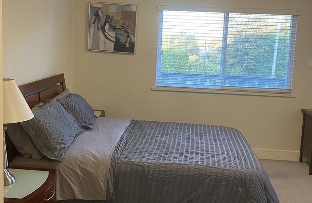 Spacious and bright bedroom with separate bathroom