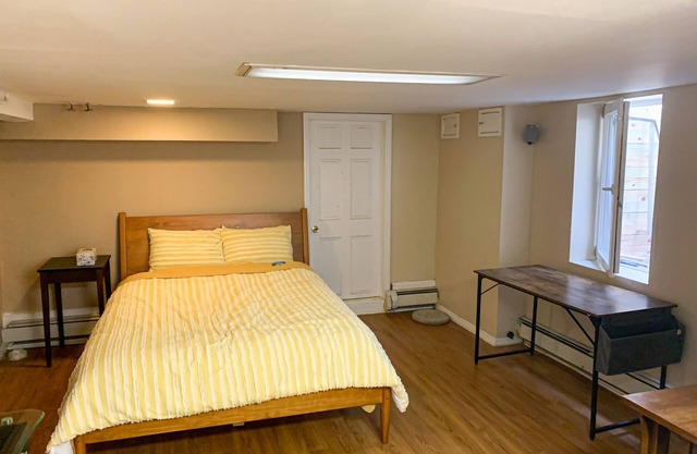 Spacious ans sunny entire basement w full bath walk to LIRR