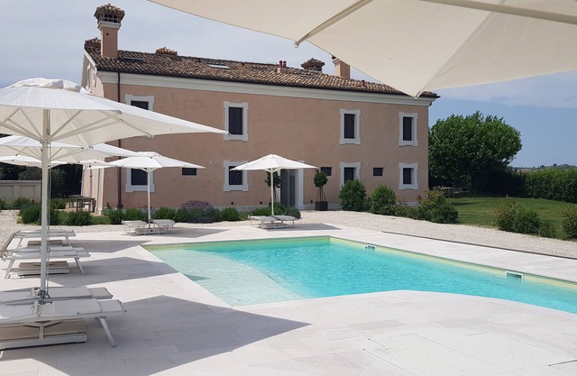 Spacious apartment in villa with pool overlooking the rolling hills