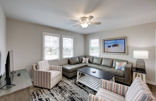 Spacious dog-friendly home with screened-in porch & pool - steps from the sand