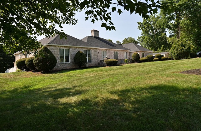 Spacious, fun filled home with fire pit, game room, deck and two acres of land