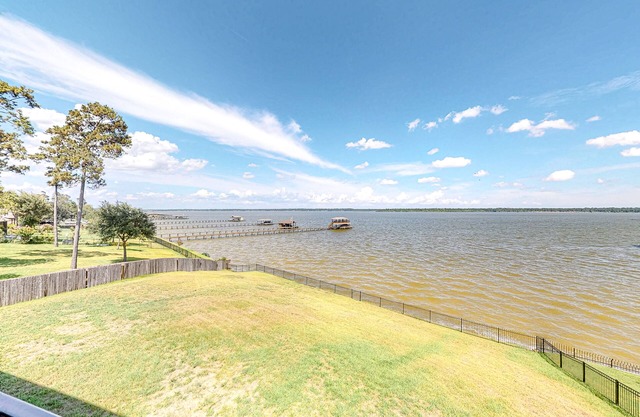 Spacious lakefront home with patio, grill, W/D, WiFi, & central AC