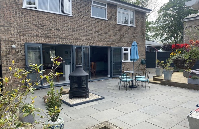 Spacious, modern family home. Open and airy in summer, cosy log fire in winter.