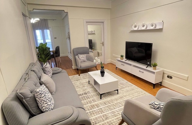 Spacious Trqnuil 4-bedroom apartment in charming Almanial with WiFi, AC