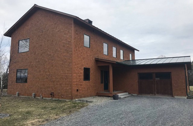 Spacious waterfront home w/phenomenal lake views, fireplace, & shared dock