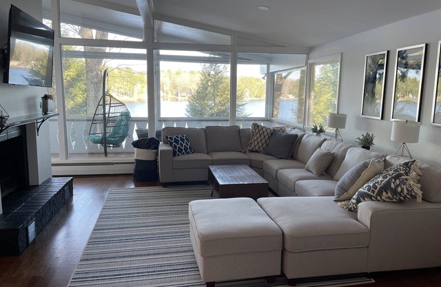 Spectacular lake house with private dock, beach area & gorgeous views