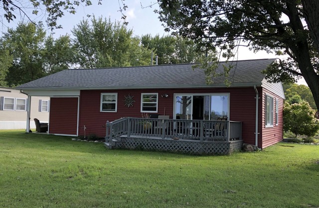 Spectacular sunset views and north chain lake front red cottage rental