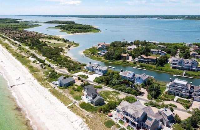 Spectacular waterfront home/boat dock/3 private beaches/gated community