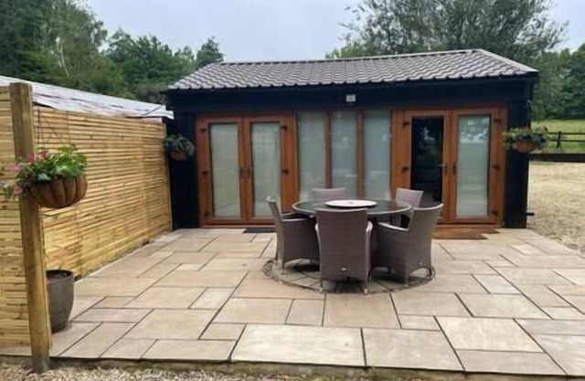Stable lodge with cosy log fire