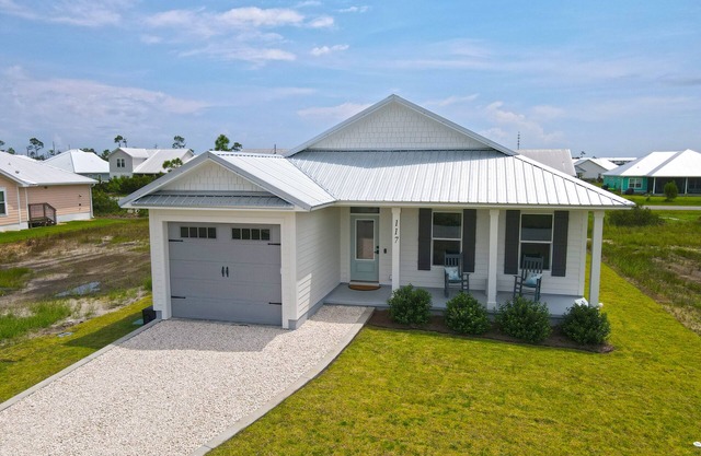 "STELLA MARIS", NEW COASTAL HOME W/OPTION TO RENT ONSITE GOLF CART.