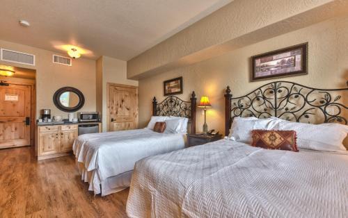 Steps to skiing, resort property, mountain views, shared hot tub, sauna, steam room 223C
