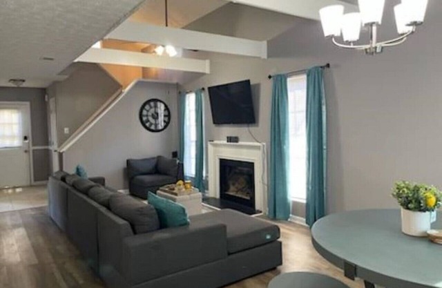 Stone Mountain Delight, Smart TVs in Every Room, Pool Table, Desk and Backyard!