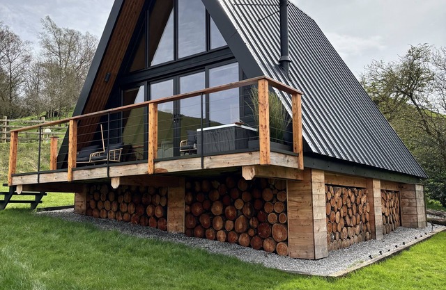 Stunning Scandinavian A Frame lodge with outside bathtub
