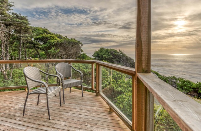 Stunning views and sunsets from this pet friendly oceanfront home with a hot tub
