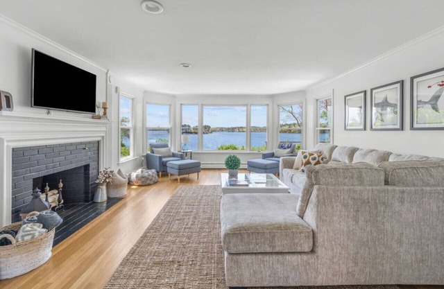 Stunning Waterfront Home with Hot Tub, Deck, Fire Pits, Office & More