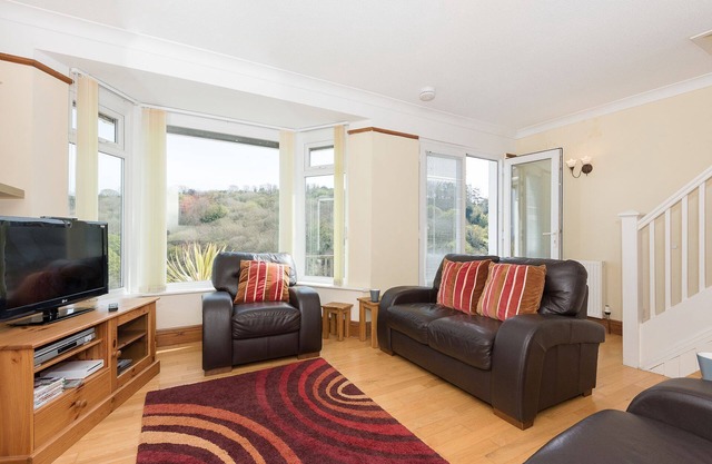 Stylish family house with superb views to the sea.