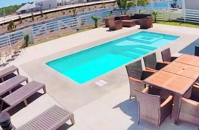 Stylish Home-Private Heated Pool-HotTub, Walk to Beach, Bikes,EV Charger & More!