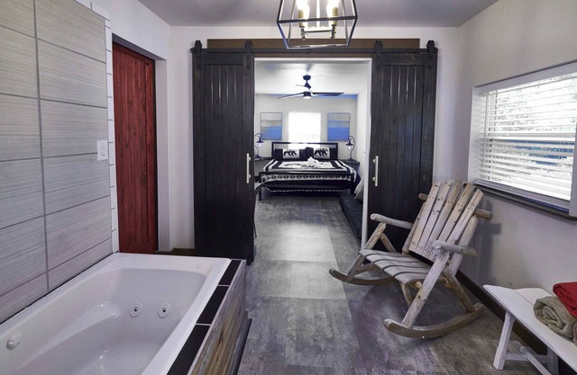 Stylish stay w/Hot Tub + Walk to Attractions