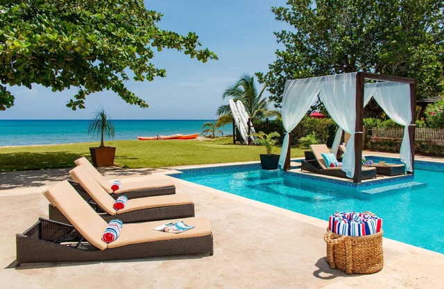 Sun Kissed Villa - 6 Bedroom, sleeps 14, on the beach.