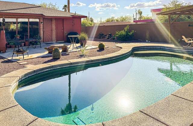 Sun-soaked & charming dog-friendly retreat with private pool, large patio, & W/D