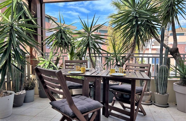 Sunny Duplex 100m from Beach with Terrace, Private Parking, and Modern Amenities