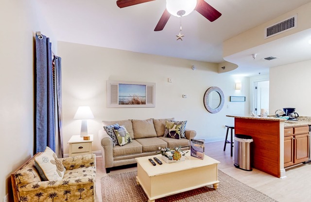 Sunset-view dog-friendly condo w/balcony overlooking water, beach access, pool & hot tub