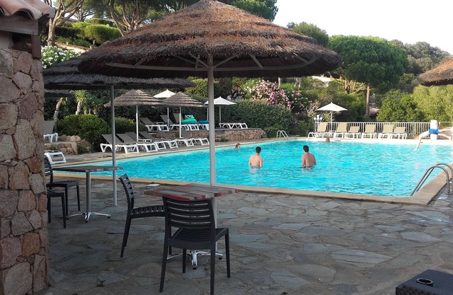 SUPERB SEA VIEW over famous bay of SANTA GIULIA in residence with private pool