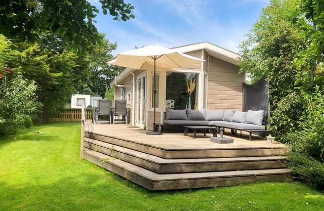 Surrounded by greenery and trees you will find this lovely four-person chalet. After a visit to the beach, you can enjoy all the luxury and comfort of your holiday chalet.