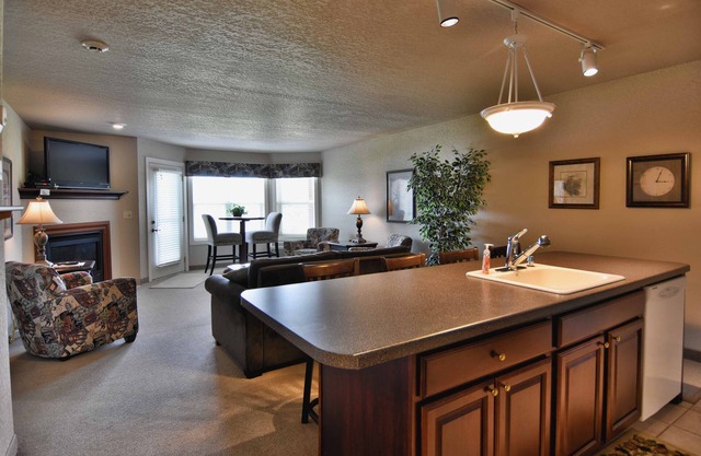 T311 condo on Tagalong Golf Course overlooking Red Cedar lake