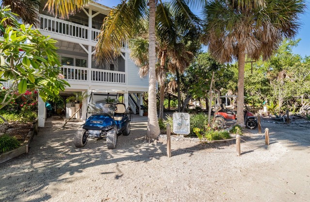 TARPON COVE - Coastal island home on a golf cart only private island