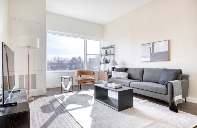 Tasteful Elmhurst 1BR w/Lounge, Pool & Gym nr Metra, by Blueground