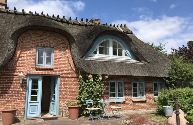 Thatched cottage in the countryside