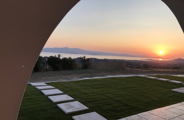 The apartment has a terrace with a panoramic view of the Aegean Sea and Paros.