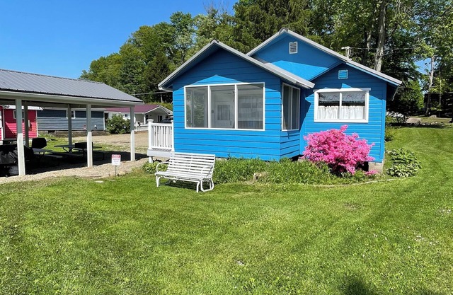 The Bluebird, a rustic lakefront cottage at The Pier at Canadohta Lake sleeps 6!