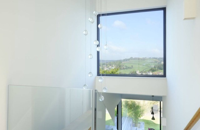 The Cedar House in Lyme Regis. Luxurious contemporary home, with a beach hut.