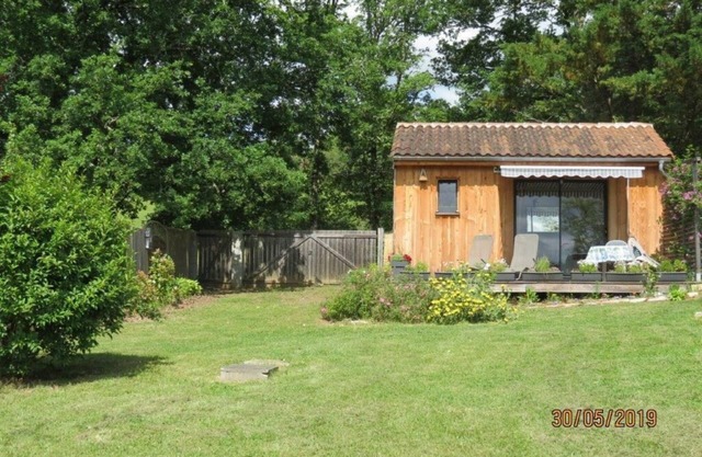 The Ensoleillade Ecological small wooden chalet of 19m2 in garden with view.