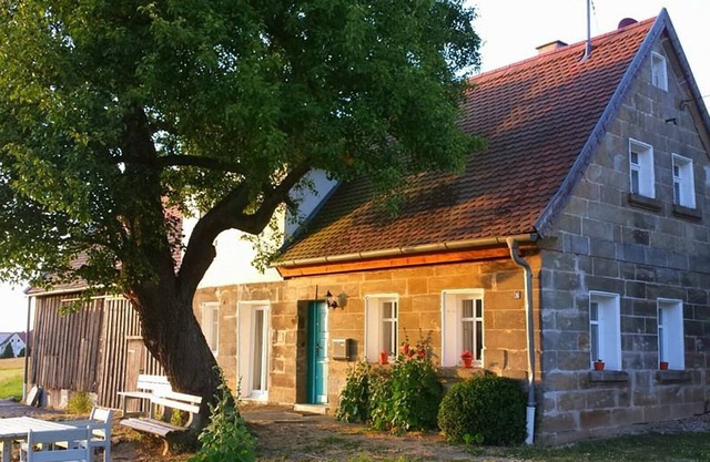 The farmhouse has been renovated from the ground up while preserving old buildings.