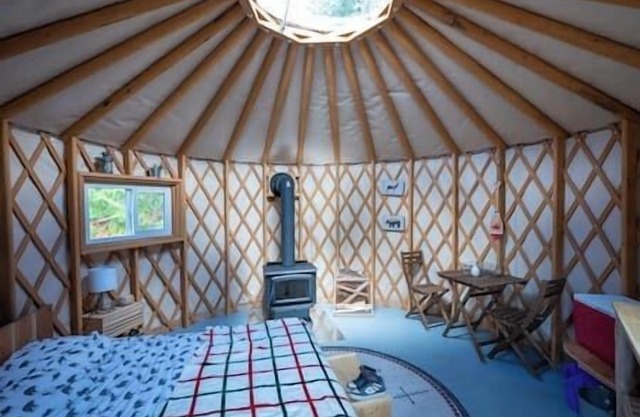 The Off-Grid Red Yurt in the woods