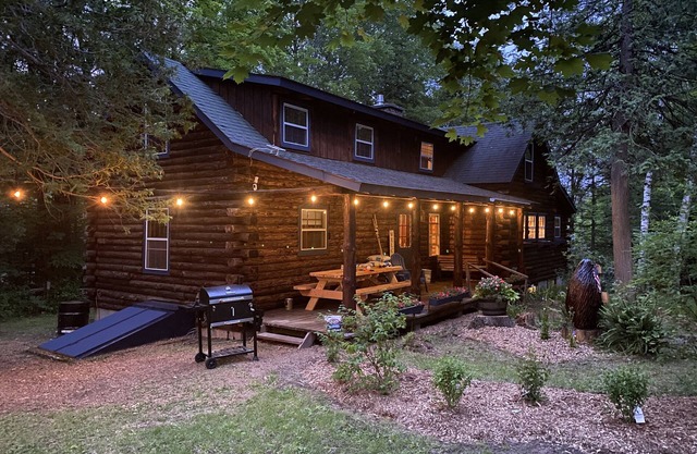 The perfect ADK log cabin getaway on 4 acres and 5 min. to town!