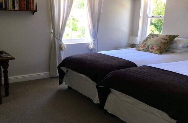 The Royal M&G GuestHouse- Family Room with Bathroom