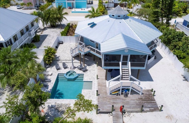 The Water House - Unique Octagonal Island Home with Heated Pool and Private Dock!