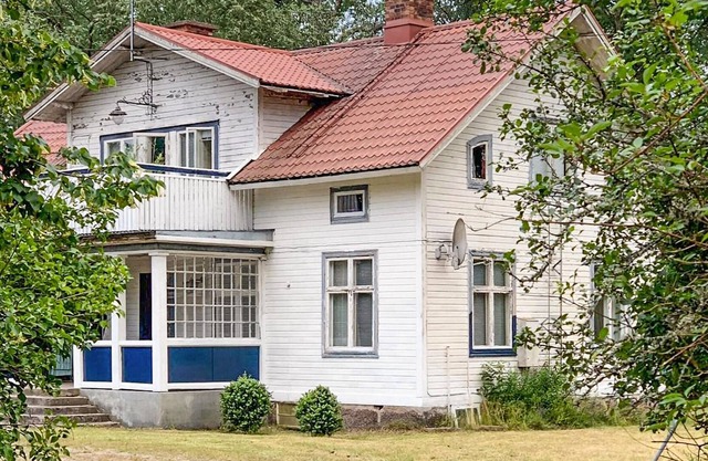 The white house is located in the middle of Småland - surrounded by forests and small lakes.
