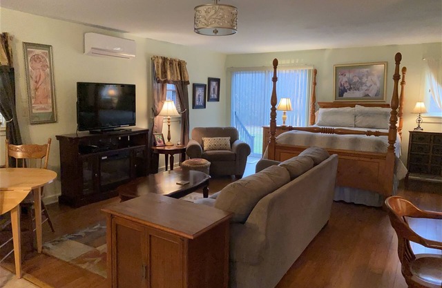 The Willow House Cottage is surrounded by gardens on two private acres.