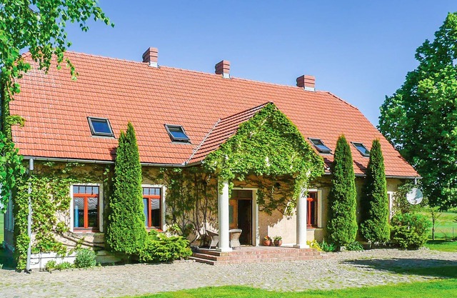 This chic country house is extremely comfortably furnished.